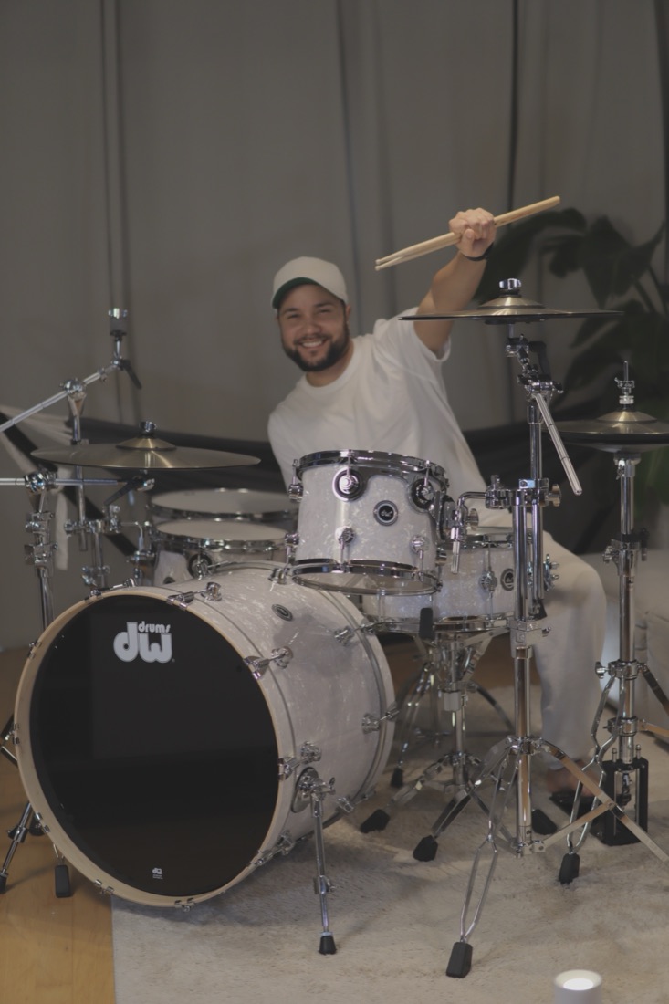 Leon Gabriel playing drums in the studio